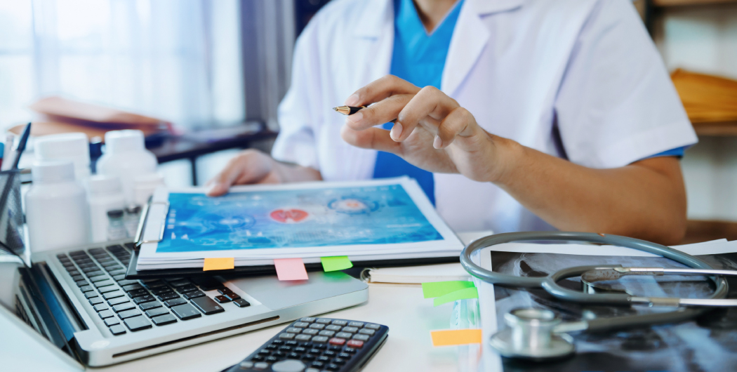 Medical professional reviewing data